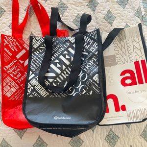 three different colors of lulu bags